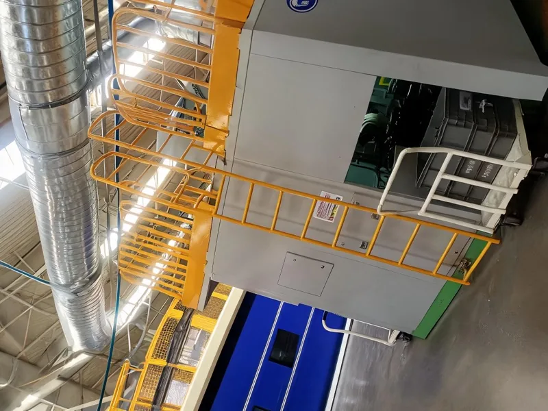 Industrial fixed ladders installed for mezzanine access in a factory